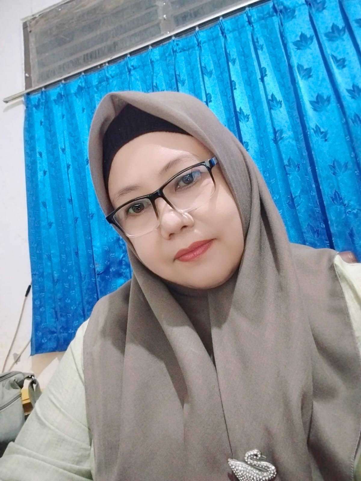 Nurzanah Ahmad, S.Pd.